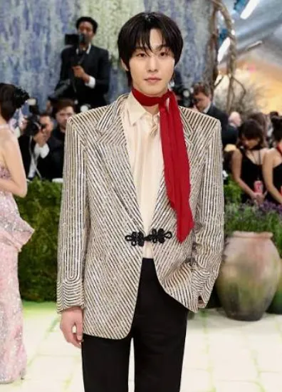 Striped formal jacket with a vivid red scarf